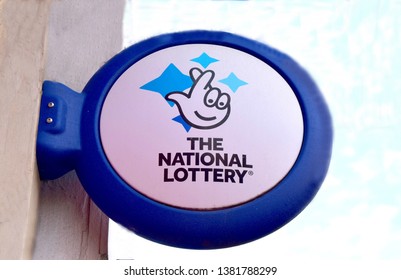 London UK April 2019: UK National Lottery Sign On Blue Sky Background.