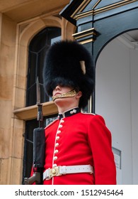 London, UK - April, 2019: Royal Guard Of London At A Post Near The Tower Of London, Close-up Portrait, View From Bottom. Soldier Of The Royal Guard Of London.