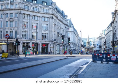 London, UK - April 2020: Famous Oxford Circus Empty And Shops Closed Due To The Covid-19 Lockdown