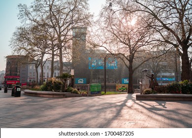 London, UK - April 2020: Leicester Square During Coronavirus Lockdown. Empty With No People. Stay Home NHS Sign. Iconic London Landmark With Famous Billboard 