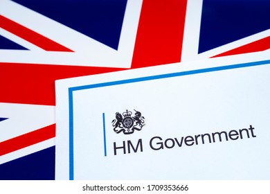 London, UK - April 20th 2020: HM Government Heading With A UK Flag Background.