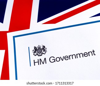 London, UK - April 20th 2020: HM Government Heading With A UK Flag Background.