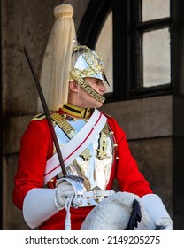 London, UK - April 20th 2022: A horse guard, or Queens Life Guard, pictured at Horse Guards Parade in Westminster, London, UK.