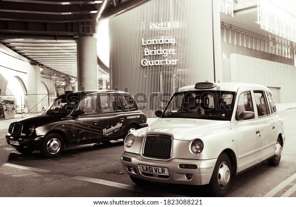 London, UK - April\
27, 2015: TX1 Hackney Carriage, also called London Taxi or Black\
Cab, near London Bridge station,  TX1 is manufactured by the London\
Taxis International,\
LTI