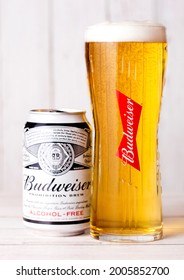 LONDON, UK - APRIL 27, 2018: Aluminium Can Of Budweiser Non Alcoholic Beer On Wooden Background With Label, An American Lager First Introduced In 1876.