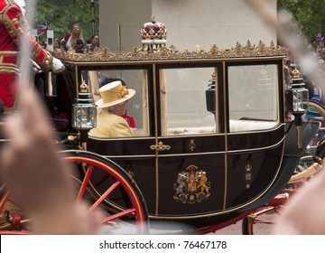 LONDON, UK - APRIL 29: Queen Elizabeth In Her Coach At Prince William And Kate Middleton Wedding, April 29, 2011 In London, United Kingdom