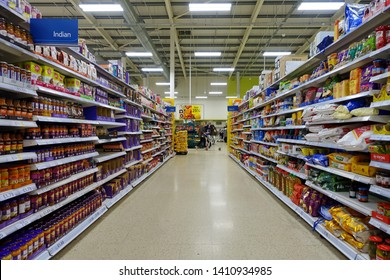 London, UK - April 4, 2019: Food Items Are Seen In An Aisle Of A Tesco Supermarket. Britain's Tesco Is The World's Third Largest Supermarket Retailer After America's Walmart And France's Carrefour.