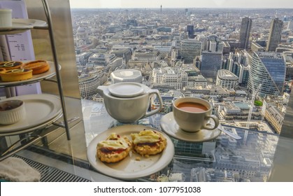 LONDON, UK - APRIL 6, 2018:  Afternoon Tea At Vertigo 42 With Aerial View Of City Of  London From The Top Floor.