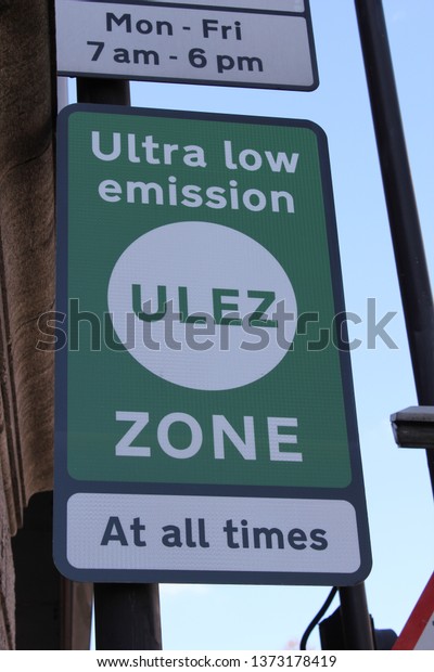 London, UK - April 9 2019: ULEZ (Ultra low emission\
zone) new charge London prepare for new Ultra Low Emission Zone\
(ULEZ) with warning signage in central London. The ULEZ, £12.50\
from 8th april