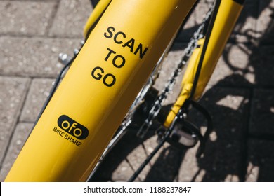 London, UK - August 1, 2018: Close up of a yellow Ofo bike on a street in London. Ofo is a dockless bike-sharing company that deployed over 10 million bicycles in 250 cities and 20 countries.