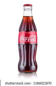 LONDON, UK - AUGUST 10, 2018: Bottle Of Original Coca Cola Soft Drink On White.