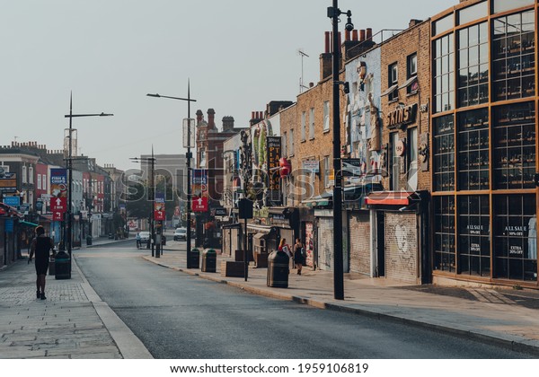London, UK -\
August 12, 2020: Closed shops and empty High Street in Camden Town,\
London, an area famed for its market and nightlife and popular with\
tourists, teenagers and\
punks.