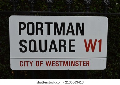 London, UK. August 15th 2015. Street Name Sign Of Portman Square With Its Iconic Design Seen In  The Square.