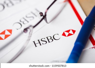 LONDON, UK - AUGUST 18, 2018: HSBC Bank Statement With Logo And Glasses.