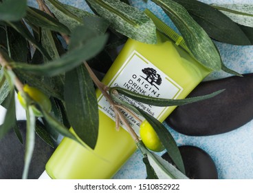 LONDON, UK - AUGUST 18, 2019: Glass Container Of Origins Overnight Hydration Mask On Spa Salon Background.