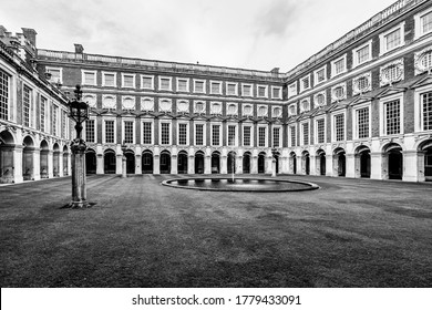 London, UK - August 2019: Hampton Court Palace Interior Yard In Black And White In The Borough Of Richmond Upon Thames, A Favourite Of King Henry VIII