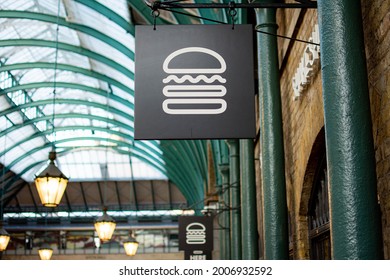 LONDON, UK - August 22, 2019:  Shake Shack’s iconic logo, seen inside historic Covent Garden Market, the American fast food chain’s first UK location.