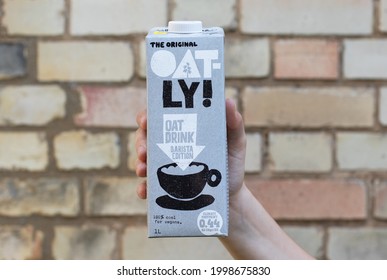 London UK - August 24th 2019 - Hand Holding An Oatly Milk Carton. Oatly Is A Dairy Free Vegan Milk Alternative.