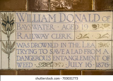 LONDON, UK - AUGUST 25TH 2017: Plaque At The Memorial To Heroic Self-Sacrifice In Postmans Park In London, On 25th August 2017. Dedicated To Ordinary People Who Died While Saving Others. 