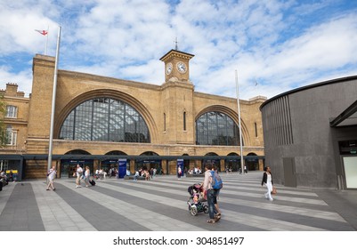 LONDON, UK - AUGUST 9, 2015: Kings Cross Railway Station London With People Walking Outside.