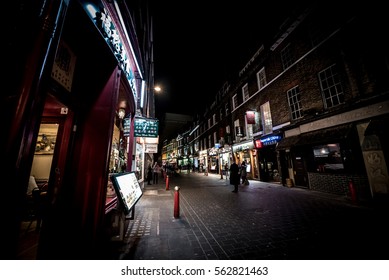 LONDON, UK - CIRCA DECEMBER, 2016: A View Down A Street On A Dark Night In Chinatown, London. Located In The City Of Westminster.