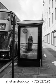 LONDON, UK - CIRCA JUNE 2017: Westminster Abbey Bus Stop With Coca Cola Ad In Black And White