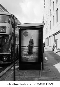 LONDON, UK - CIRCA JUNE 2017: Westminster Abbey Bus Stop With Coca Cola Ad In Black And White