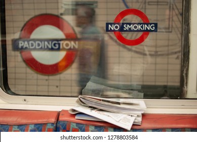 LONDON, UK - CIRCA SEPTEMBER 2014: Paddington underground station sign and No Smoking sign on the underground, London. Editorial use only.