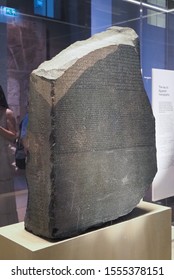 LONDON, UK - CIRCA SEPTEMBER 2019: Rosetta Stone Stele At The British Museum With Text In Ancient Egyptian Hieroglyphic, Demotic Scripts And Ancient Greek