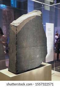 LONDON, UK - CIRCA SEPTEMBER 2019: Rosetta Stone Stele At The British Museum With Text In Ancient Egyptian Hieroglyphic, Demotic Scripts And Ancient Greek