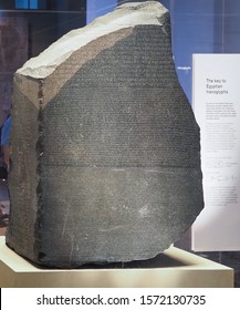 LONDON, UK - CIRCA SEPTEMBER 2019: Rosetta Stone Stele At The British Museum With Text In Ancient Egyptian Hieroglyphic, Demotic Scripts And Ancient Greek