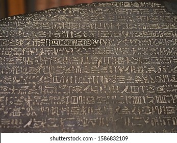 LONDON, UK - CIRCA SEPTEMBER 2019: Rosetta Stone Stele At The British Museum With Text In Ancient Egyptian Hieroglyphic, Demotic Scripts And Ancient Greek