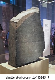 LONDON, UK - CIRCA SEPTEMBER 2019: Rosetta Stone Stele At The British Museum With Text In Ancient Egyptian Hieroglyphic, Demotic Scripts And Ancient Greek