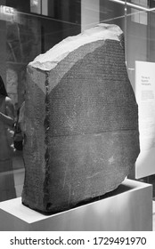 LONDON, UK - CIRCA SEPTEMBER 2019: Rosetta Stone Stele At The British Museum With Text In Ancient Egyptian Hieroglyphic, Demotic Scripts And Ancient Greek In Black And White