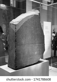 LONDON, UK - CIRCA SEPTEMBER 2019: Rosetta Stone Stele At The British Museum With Text In Ancient Egyptian Hieroglyphic, Demotic Scripts And Ancient Greek In Black And White