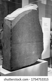 LONDON, UK - CIRCA SEPTEMBER 2019: Rosetta Stone Stele At The British Museum With Text In Ancient Egyptian Hieroglyphic, Demotic Scripts And Ancient Greek In Black And White