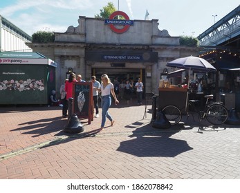 LONDON, UK - CIRCA SEPTEMBER 2019: Travellers At Embankment Tube Station