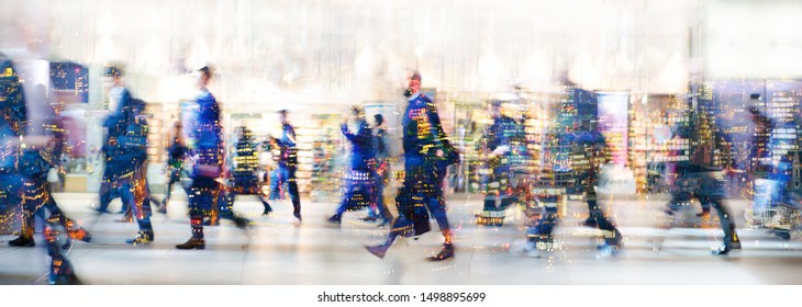 London, UK. Crowd of people walking at work in early morning. Concept wide background with  space for text. Multiple exposure image