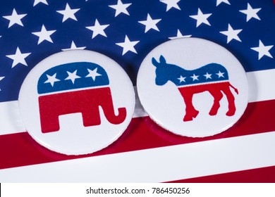 LONDON, UK - DECEMBER 18TH 2017: The Elephant Symbol Of The Republican Party And The Donkey Symbol Of The Democratic Party, With The American Flag Behind, On 18th December 2017.