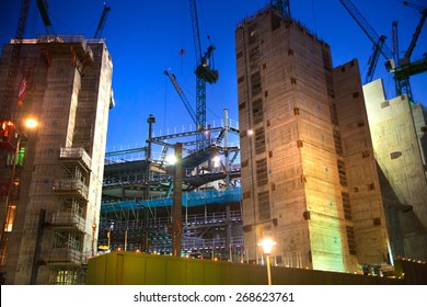 LONDON, UK - DECEMBER 19, 2014: Building Site With Cranes In The City Of London Business. New Development Next To Bank Of England. Night View