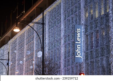 LONDON, UK - DECEMBER 20: Nighttime shot of John Lewis department store with its wall of light as part of its Christmas decoration. December 20, 2014 in London.