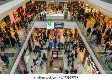 LONDON, UK - DECEMBER, 2018: Westfield Stratford City Shopping centre with lots of people rushing for Christmas sale.
