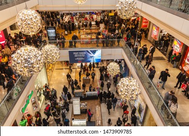 LONDON, UK - DECEMBER, 2018: Westfield Stratford City Shopping centre with lots of people rushing for Christmas sale.