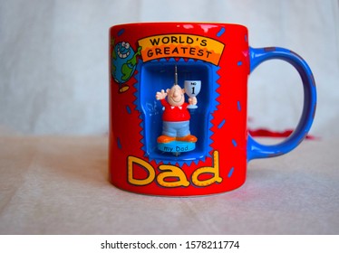 London UK December 2019: Funny Mug Design World Greatest Dad On Light Background.