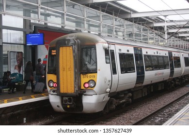 London, UK - December 25, 2016: Stansted Express / Greater Anglia Class 379 Train Departing Tottenham Hale Station In London