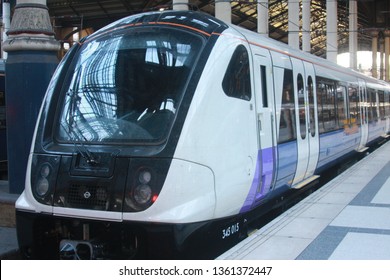 London, UK - December 28, 2017: A Transport For London Crossrail / Elizabeth Line / TFL Rail Train Sitting On A Platform At London Liverpool Street