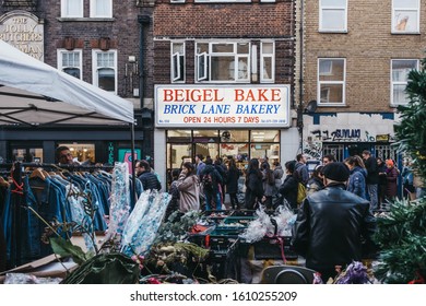 London, UK - December 29, 2019: Facade Of Beigel Bake Shop In Brick Lane, People Walk In Front, Motion Blur, Selective Focus. Brick Lane Is The Heart Of The Londons Bangladeshi-Sylheti Community.