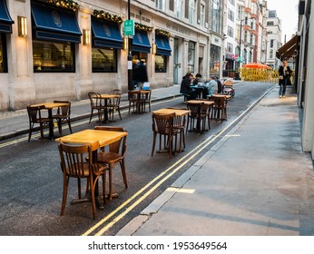 London UK, December 6th 2020: Upper James Street, Restaurant Dining Chairs And Tables Outside. Outdoor Seating And Eating. Re-opening, After Lockdown. Social Distancing. Hospitality Industry. 