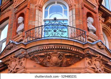 LONDON, UK: Details of red brick Victorian houses facades in the borough of Westminster