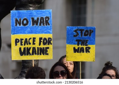 London, UK. Feb 26 2022. Protest Banners in the colours of the Ukrainian flag with the words ‘no war peace for Ukraine stop the war’ being held by protesters against Russia’s invasion of Ukraine 